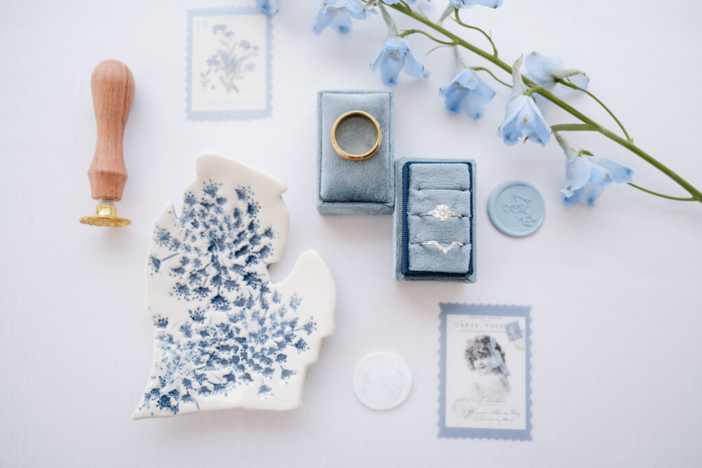 Hidden garden ceremony space at The Inn at Stonecliffe Mackinac Island wedding venue with wooden chairs and lush greenery. Wedding photographer
