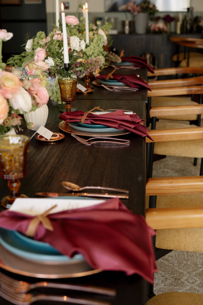 Elegant wine colored napkins and florals at the Hotel Chalet in Chattanooga TN