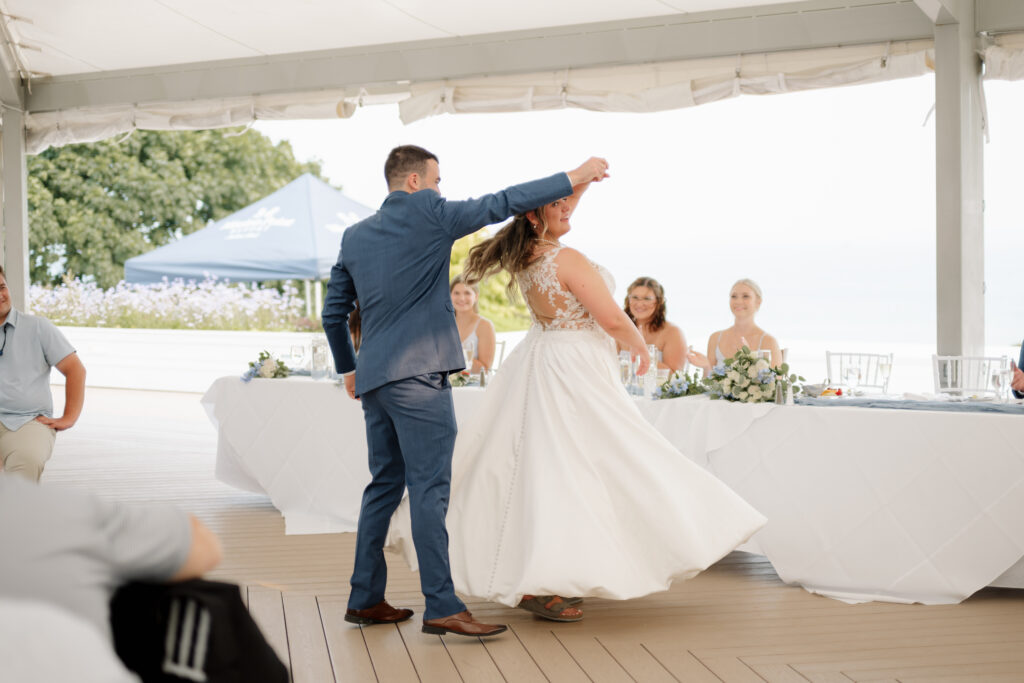 Bride and Groom share a first dance on the dance floor at Mission Point Resort on Mackinac Island
