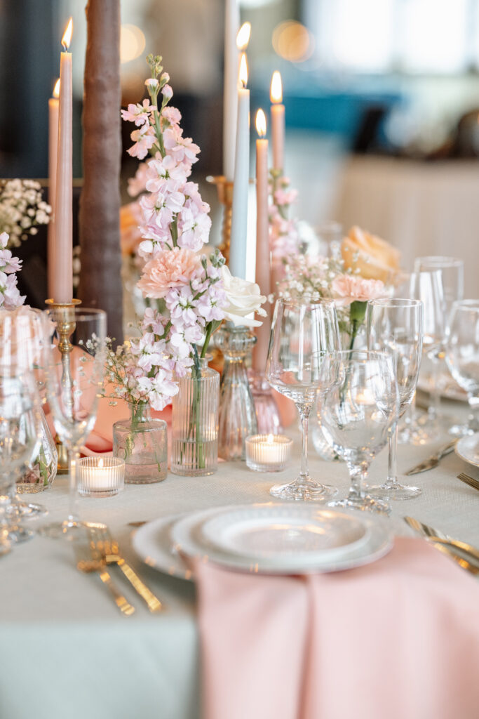 Pink floral table decor at the wedding reception.